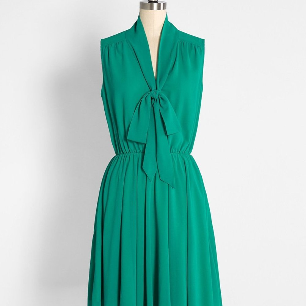 Molly Bracken Bliss In a Swish Tie-Neck Dress